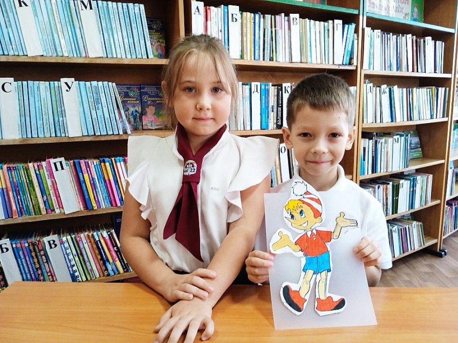 Библиотека. Библиотекарь. Книга.